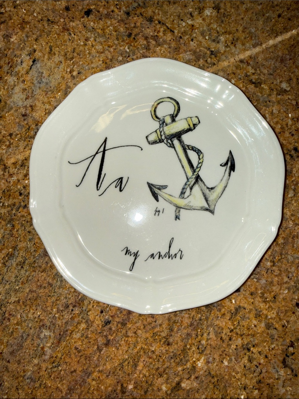 Anthropologie Cream Plate with Black Script and Yellow-Accented Anchor